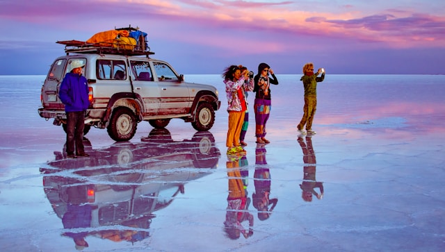Group of travel photographers taking pictures.